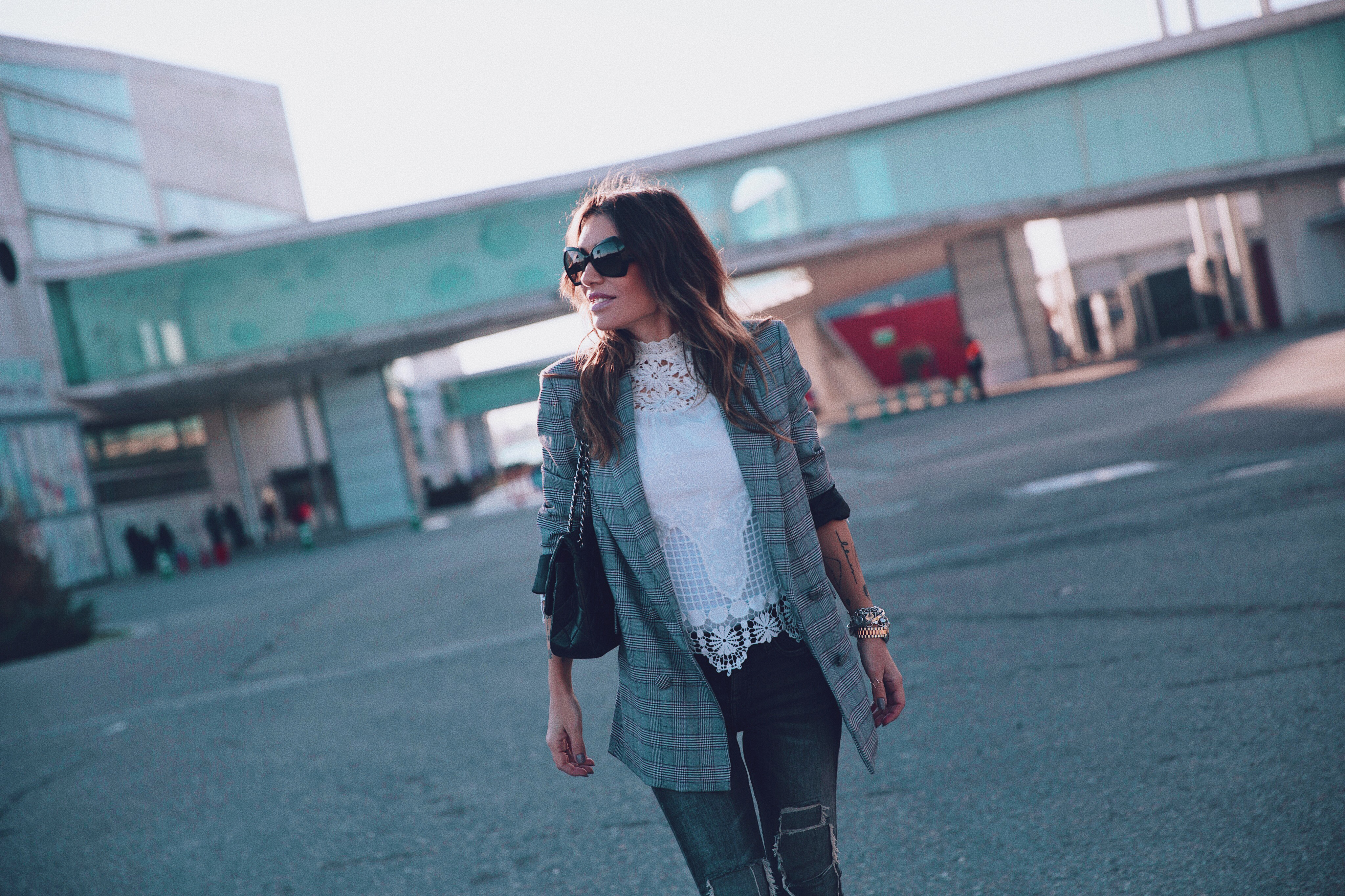 Bárbara Crespo streetstyle. Blazer, blouse and Doctor Martens boots. Chanel bag. Chanel sunglasses
